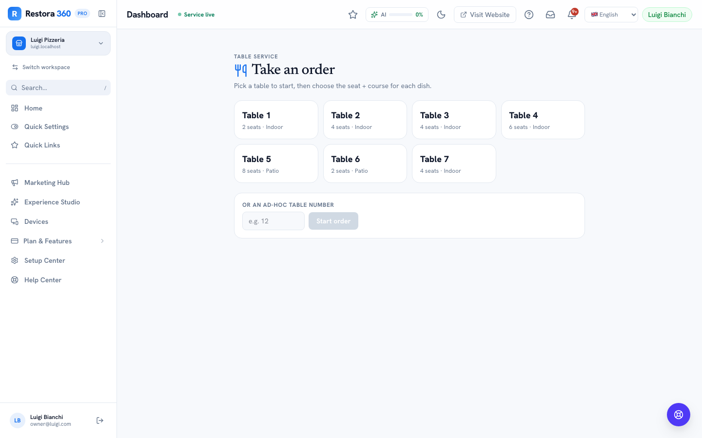 Take Order table picker with a grid of tables and an ad-hoc table number field — web view